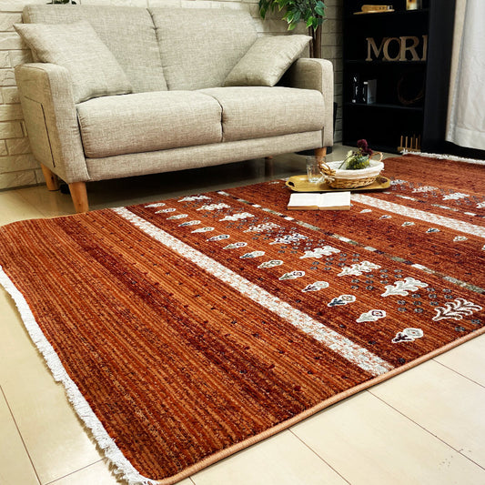 大地の恵みを感じさせてくれる木や花のモチーフがいきいきと愛らしい鮮やかな色合いが印象的なギャベデザインウィルトンラグ　カレル【オレンジ】